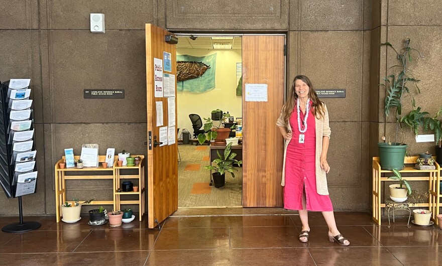 Outgoing Public Access Room coordinator Virginia Beck stands outside the office in Room 401 at the Hawaiʻi State Capitol on May 29, 2024.