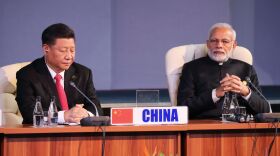 (LtoR) China's President Xi Jinping and India's Prime Minister Narendra Modi attend a session meeting during the 10th BRICS summit (acronym for the grouping of the world's leading emerging economies, namely Brazil, Russia, India, China and South Africa) on July 27, 2018 in Johannesburg, South Africa. (Photo by MIKE HUTCHINGS / POOL / AFP)        (Photo credit should read MIKE HUTCHINGS/AFP via Getty Images)