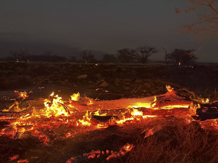 A wildfire burns in Kīhei, Hawaiʻi late Wednesday, Aug. 9, 2023. Thousands of residents raced to escape homes on Maui as blazes swept across the island, destroying parts of a centuries-old town in one of the deadliest U.S. wildfires in recent years.