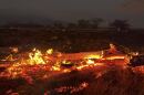 A wildfire burns in Kīhei, Hawaiʻi late Wednesday, Aug. 9, 2023. Thousands of residents raced to escape homes on Maui as blazes swept across the island, destroying parts of a centuries-old town in one of the deadliest U.S. wildfires in recent years.