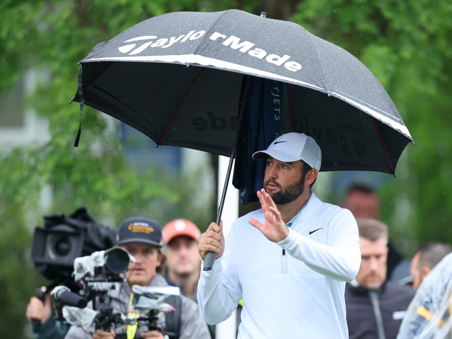 Scottie Scheffler reacts before teeing off Friday on during the second round of the 2024 PGA Championship at Valhalla Golf Club in Louisville, Ky. Scheffler was arrested and charged after an interaction early Friday morning with a police officer directing traffic into to the club.