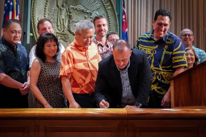 Gov. Josh Green signs bill on May 30, 2024.